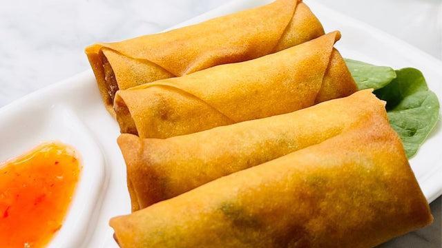 Spring Roll · Crispy veggie spring roll served with sweet chili sauce