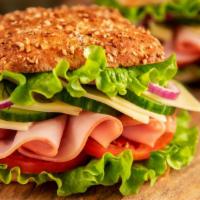 Boiled Ham Sandwich · Freshly prepared Boiled Ham sandwich topped with lettuce, tomato, and cheese. Served on Cust...