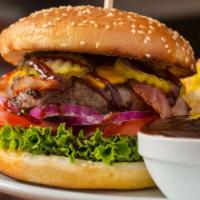 Bbq Cheeseburger · Fresh off the grill Cheeseburger topped with BBQ sauce, lettuce, tomato, and onion.