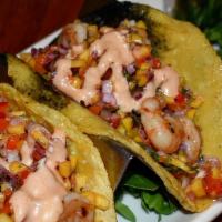 Shrimp Tacos · mango pico de gallo, red and green sauce.