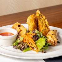 Spring Roll · cabbage, carrots, ginger, red peppers, rice paper.