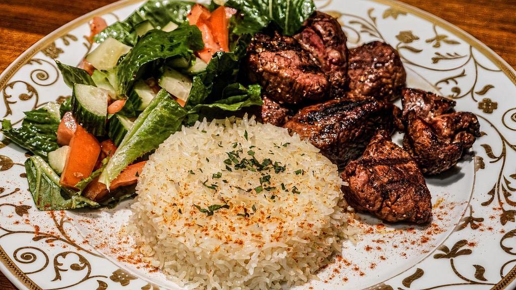 Shish Kebab · specially marinated beef, herb and spices blend, rice.