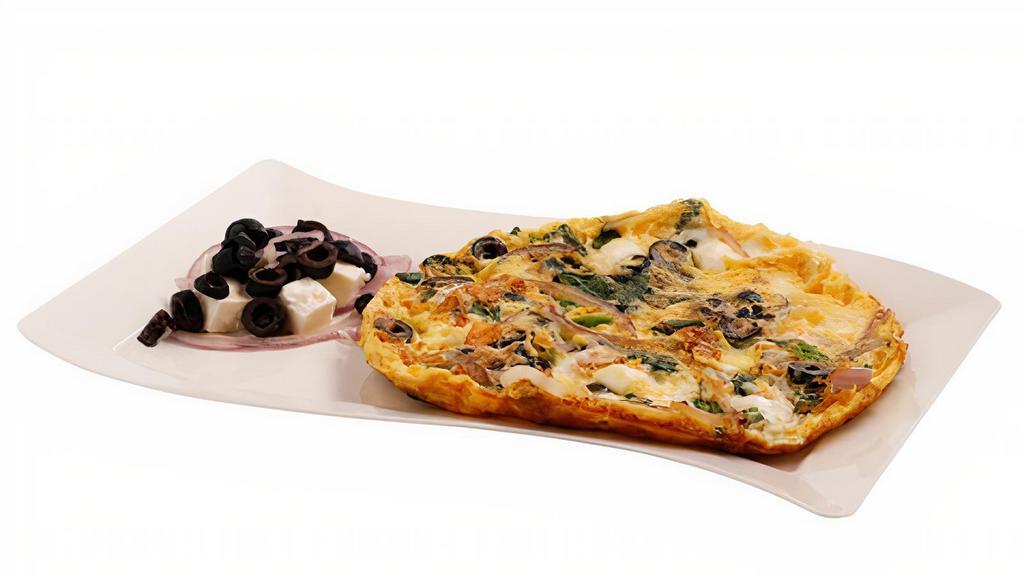 Greek Omelette · Feta cheese, black olives, red onions and spinach.