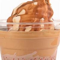 Affogato · Premium soft vanilla ice cream topped with a shot of espresso and swiss chocolate.