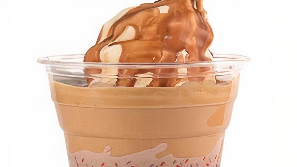 Affogato · Premium soft vanilla ice cream topped with a shot of espresso and swiss chocolate.