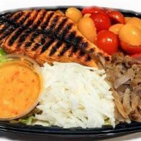 Chilli Panini Salmon Salad · A delicious and vibrant colorful salad with romaine lettuce, Heirloom cherry tomatoes, Grill...