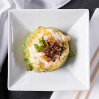 Spicy Fried Rice · Organic fried egg, crispy shallots, spicy scallions.
