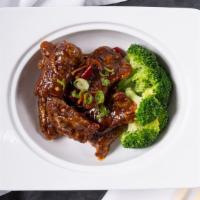 Tangerine Beef · Natural beef, tangy sauce.