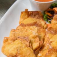 Wonton · Thai style fried wontons filled with ground chicken served with sweet chili garlic sauce.