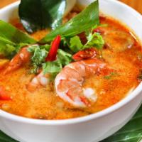 Tom Yum Goong Soup · Hot. Thai style hot and sour soup with shrimp, onion, lemongrass, and lime juice.