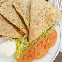Quesadilla · Grilled chicken or steak, Monterey Jack and Vermont Cheddar cheese, sautéed onions, peppers,...
