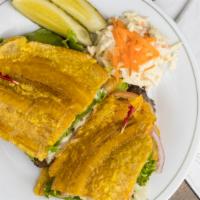 El Jibarito (Puerto Rican Sandwich) · Fried plantain wafers, steak, mozzarella cheese, lettuce, tomato, mayo, onions, and avocado.