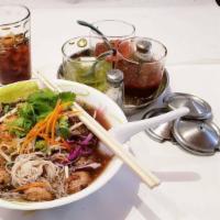 Thai Boat Noodle Soup · Thai Style Noodle soup with Tender Pork Spare Rib or Sliced Beef, meat balls, beansprouts, C...