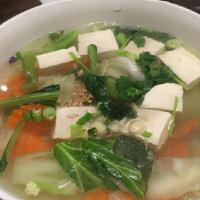 Tofu Soup · Minced chicken or vegetable with tofu in clear soup.