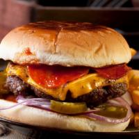 Texas Burger · Mouthwatering Burger topped with caramelized  onions, lettuce, tomato and cheese with fried ...