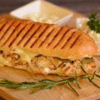 Chicken Fajita Panini · Grilled Panini Sandwich made on a European Flatbread, and topped with Grilled chicken, caram...