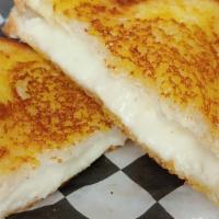 Grilled Cheese Sandwich · A home-style classic made with American cheese on buttery TEXAS Style white bread.