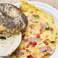 Western Omelette · Three egg omelette with ham, onions, and peppers served on. fresh Zuckers bagel.