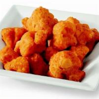 Buffalo Cauliflower Bites · Crispy mild Spicy Battered Cauliflower with Aleppo Pepper.