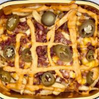 Southwest Fries · Our signature extra crispy fries topped with bacon, cheddar, mozzarella, jalapeno, chipotle ...