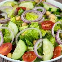 House Salad - · Romaine, red onions, grape tomatoes, chickpeas, cucumbers and black olives. Served with brea...