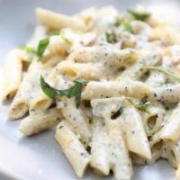 Penne Alfredo · Classic cream sauce. Choice of spaghetti, penne, or angel hair. Served with garlic bread che...