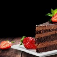 Chocolate Mousse Cake · OUR SCRATCH MADE CHOCOLATE MOUSSE SURROUNDED BY A BUTTERY OREO COOKIE CRUMB CRUST. OUR CAKE ...