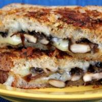 Mushroom Grilled Cheese · Melted swiss cheese, roasted mushrooms, caramelized onions, balsamic vinegar, and mayo betwe...