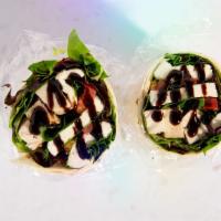 Caprese Wrap · Fresh Mozzarella, Tomato, Pesto, Mixed Greens, Flour Wrap