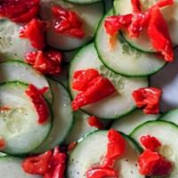 Fresh Cucumber Salad · Fresh seedless cucumbers sprinkled with extra virgin olive oil and sea salt.