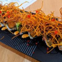 Akino Roll · Inside spicy kani and cucumber topped with eel, avocado, tobiko, sweet potato crisps, spicy ...