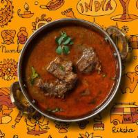 Railway Goat Curry · Succulent goat meat slow-cooked in a classic brown curry.