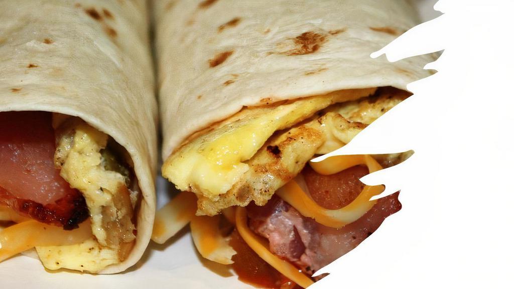 Bacon Breakfast Burrito · Two scrambled eggs, crispy bacon, breakfast potatoes, and melted cheese wrapped in a fresh flour tortilla