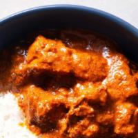 Chicken Curry /Basmati Rice · Pieces of chicken gently cooked in our thick curry sauce.