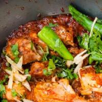 Large Chicken Karahi , · Chicken pieces gently cooked with fresh tomato, green chiles, ginger and other spices and he...