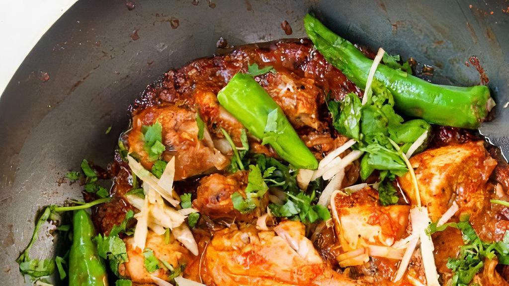 Large Chicken Karahi , · Chicken pieces gently cooked with fresh tomato, green chiles, ginger and other spices and herbs.