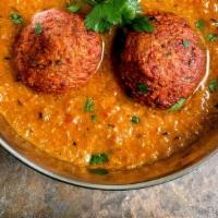 Chicken Kofta ,Basmati Rice · Ground chicken meatballs cooked with herbs and spices.