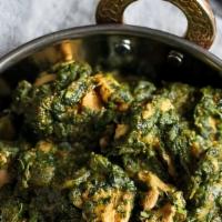 Chicken Palak /Basmati Rice · Chicken pieces gently cooked with spinach and sauce.
