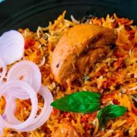 Chicken Biryani · Slowly cooked rice with freshly ground spices and chicken with special herbs.