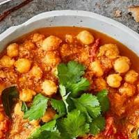 Chana Masala/Basmati Rice · Vegetarian. Chickpeas cooked in fresh onions, tomato and garlic sauce.