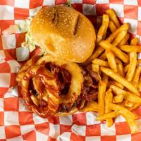 Minn'S Burger · CHEDDAR CHEESE, BACON, BBQ SAUCE, TOPPED WITH ONION RING