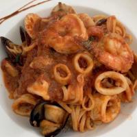 Michaelangelo'S Seafood Special · Shrimp, mussels, clams, and calamari, sautéed in our special marinara sauce, served over lin...