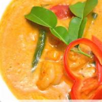 Panang Curry · Gluten free. Spicy. Coconut milk, lime leaf, bamboo, bell peppers, onions, zucchini, and egg...