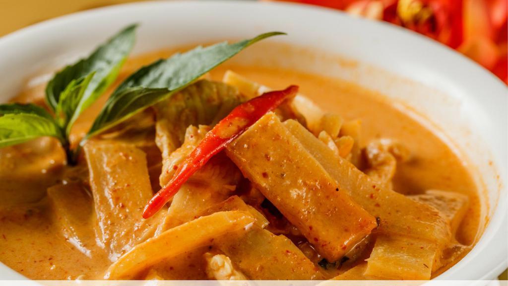 Red Curry · Gluten free. Spicy. Coconut milk, bell peppers, onions, bamboo, zucchini, and lime leaf.