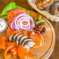 Fish Plate · House-smoked fish curated by our chefs: salmon, arctic char, and torched pickled mackarel, s...