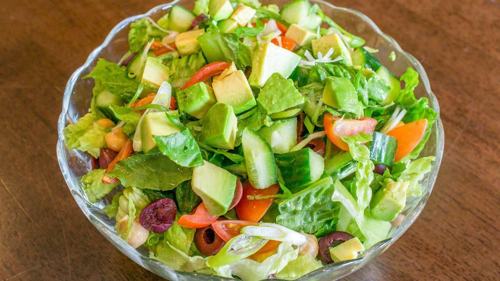 Edith'S Chopped Salad · Edith's Signature Salad made up of romaine lettuce, grape tomatoes, cucumbers, avocado, chickpea, scallions, and two House-made dressings. Add house-smoked fish for an additional charge.
