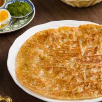 Malawach · Pan-seared Malawach flatbread, served with grated tomato, house-made Bay Leaf oil, and zhug ...