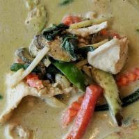 Green Curry · A classic Thai curry made with a medley of spices and fresh chilis, typically with a slightl...