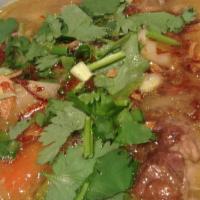 Southern-Style Oxtail Soup · A hearty and incredibly herbaceous soup. If you love oxtail soup or you’re not sure if you d...