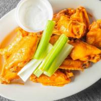 Buffalo Chicken Wings · Served with choice of mild, medium, hot or nuclear sauce together with blue cheese dressing ...